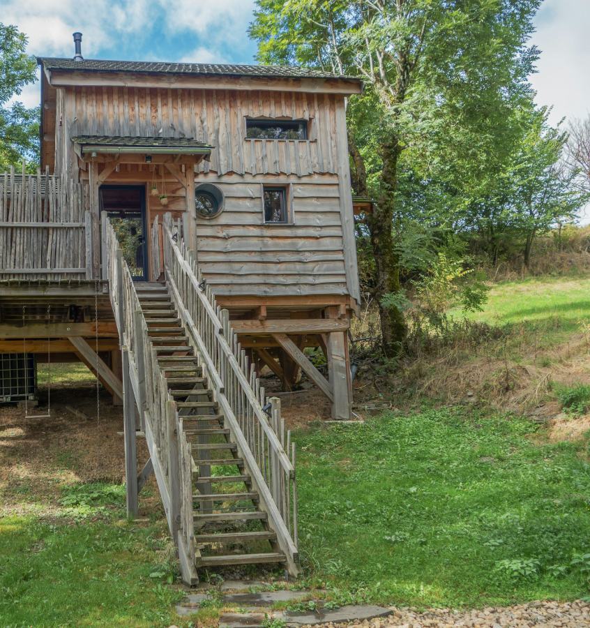 Timber stairs climbing to a lodge on stilts